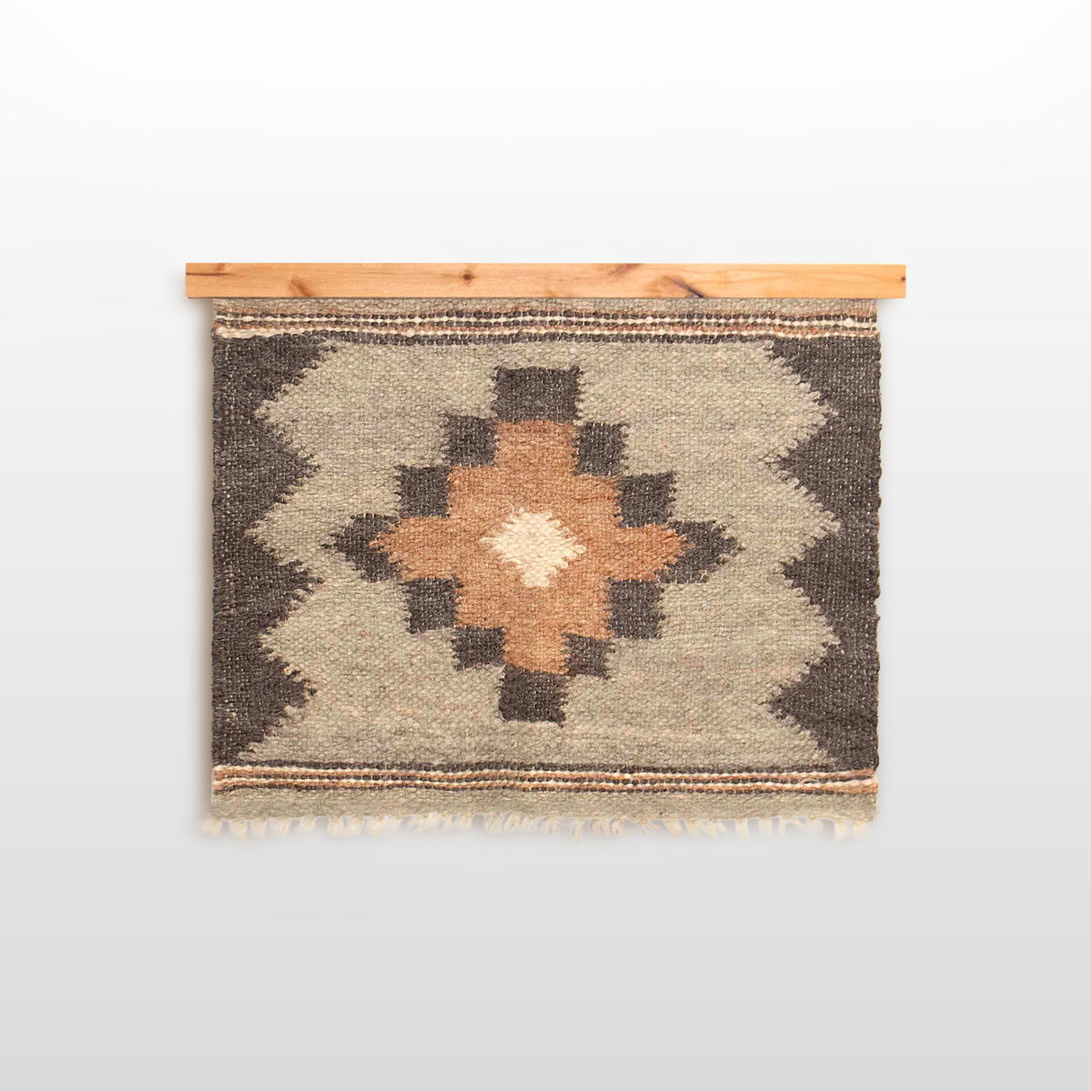 The Myr (Peace) Wool Wall Hanging features a geometric pattern crafted from all-natural undyed yarn on a wooden rod, with earthy tones inspired by Ukrainian tradition, shown against a white background.