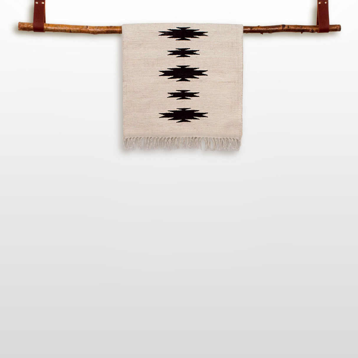 The Chysto (Pure) Wool Rug / Wall Hanging is displayed on a Hemlock Wood Rug Hanger, combining organic warmth and style in a unique art ensemble ($240 value).