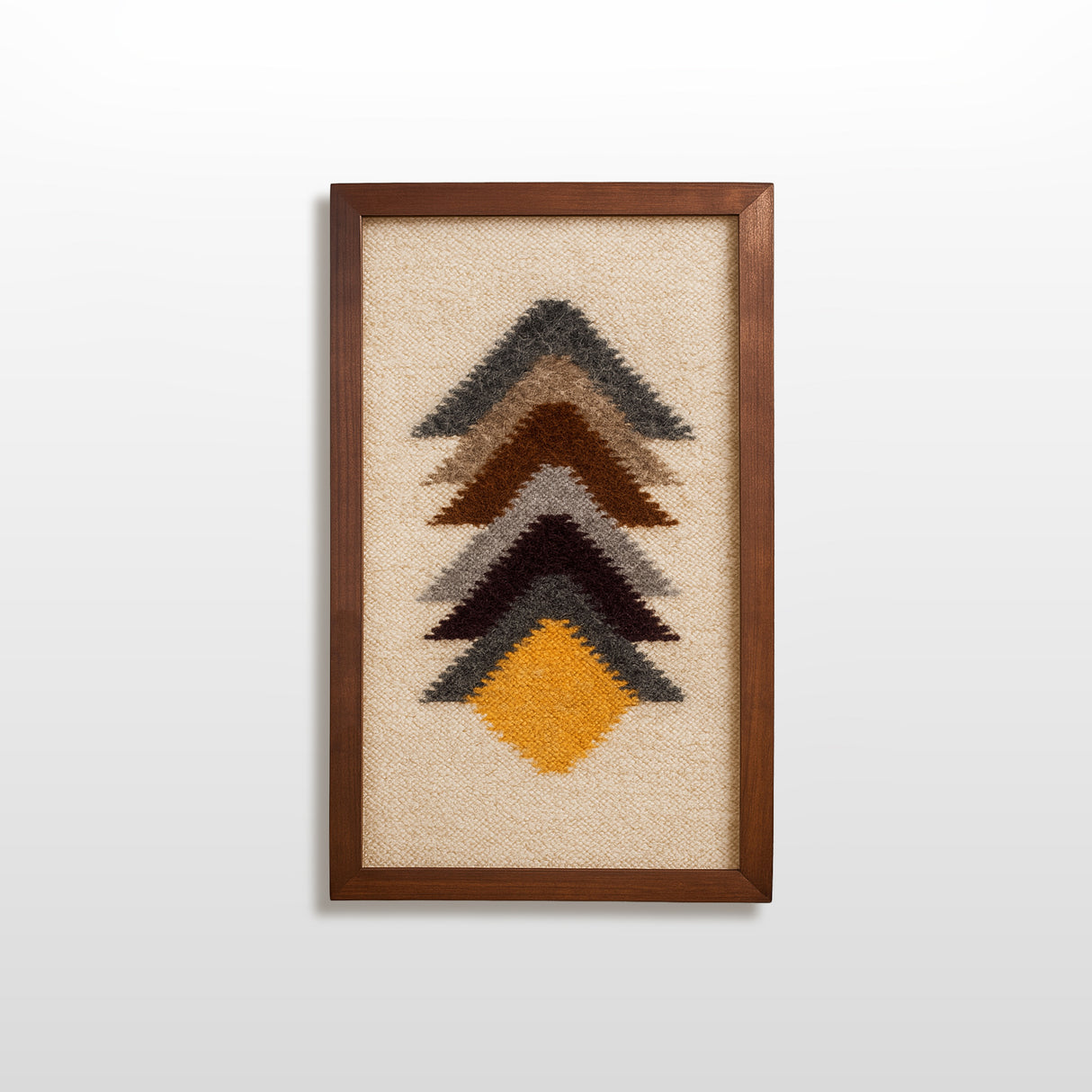 The Strilka (Arrow) Wool Framed Wall Art features five earthy chevron patterns on beige, in a cedar frame, offering stylish and eco-friendly decor.