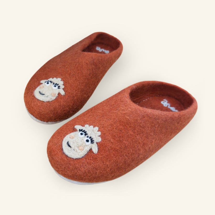 Pair of Love Ewe Hand-Felted Organic Wool Slippers for Women (Blush-OG), featuring adorable cartoon sheep faces on the toes, made from organic wool and shown against a plain background.