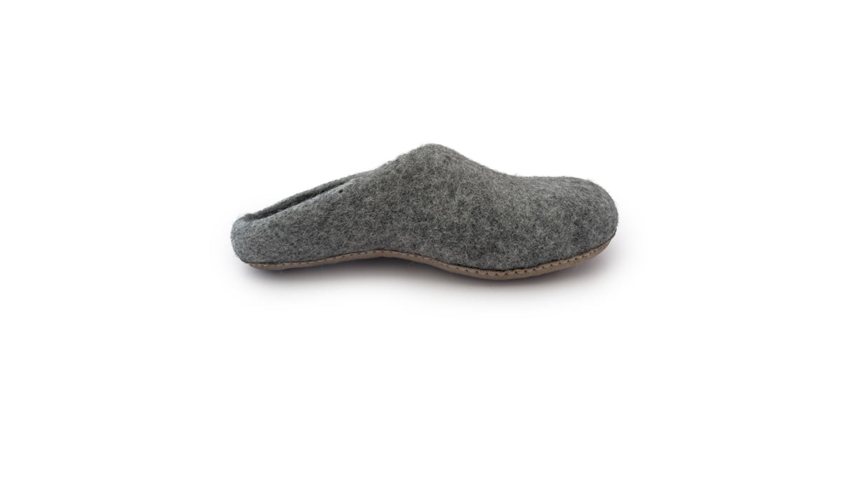 A single blush Love Ewe Hand-Felted Organic Wool Slipper for Women (Blush-DG), handmade in Nepal with a brown sole, is photographed on a white background.