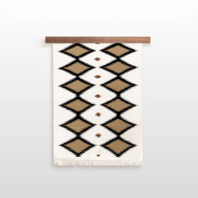 Handmade in Ukraine, this organic 100% sheep wool rug features brown, black, and white geometric diamonds—ideal as eco-friendly wall decor for neutral homes.