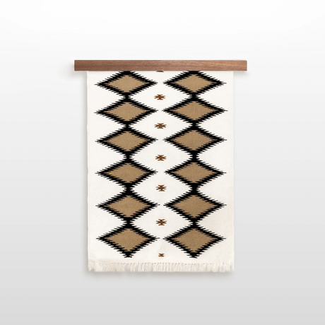 Handmade in Ukraine, this organic 100% sheep wool rug features brown, black, and white geometric diamonds—ideal as eco-friendly wall decor for neutral homes.