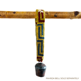 A Large Strap for Hanging Vintage Bells, featuring a yellow, red, and blue handcrafted pattern, suspends a small metal bell from a wooden rod.