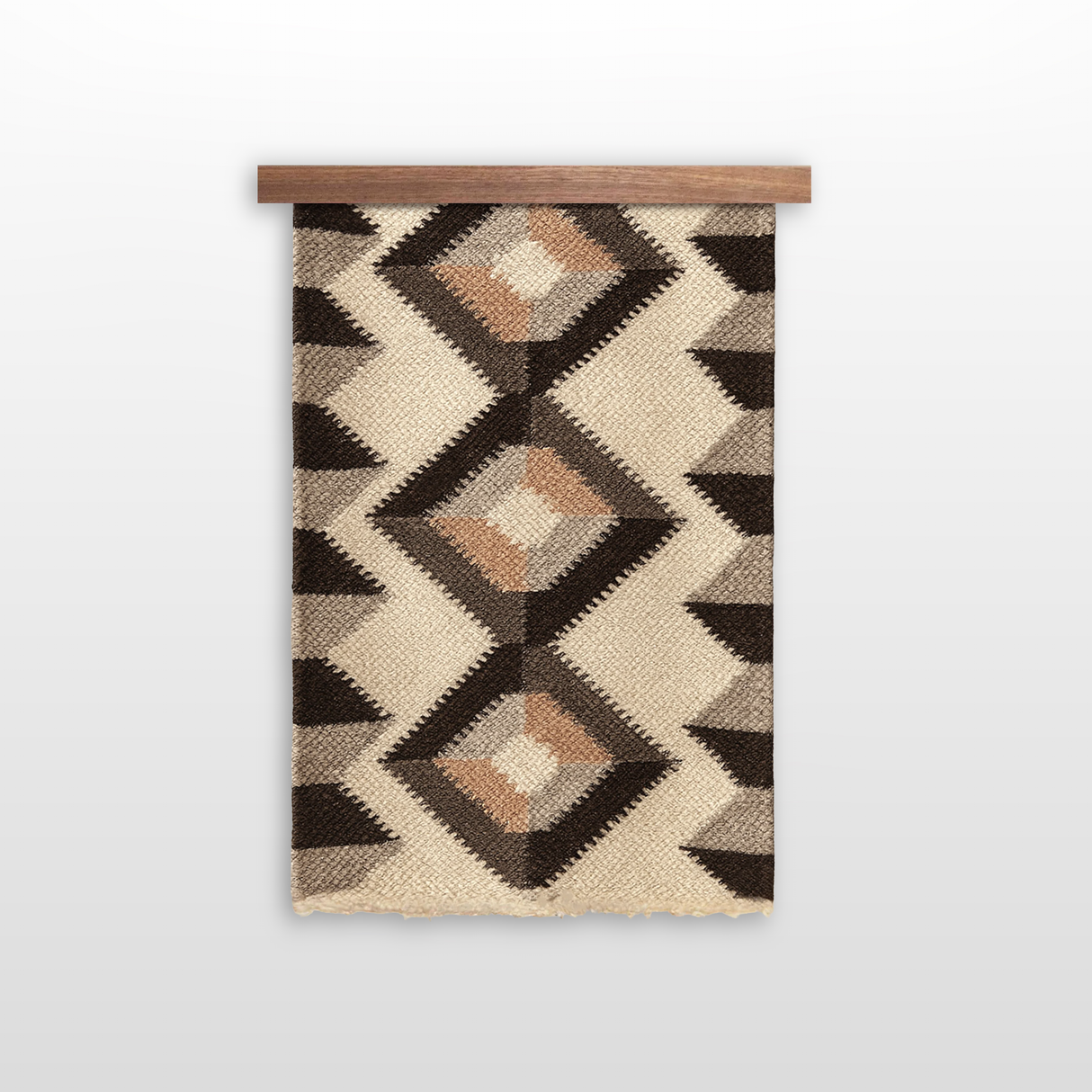 The Svitlo (Bright) Wool Wall Hanging features a geometric pattern in neutral tones, crafted from organic Carpathian wool and displayed on a wooden rod against a white background.