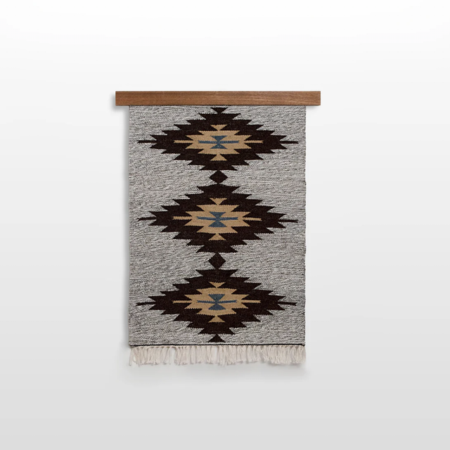 The Handmade in Ukraine Organic Natural 100% Sheep Wool Woven Rug Wall Hanging Decor features geometric diamond patterns in brown, beige, and blue on gray, evoking the classic style of Ukrainian artisan craftsmanship.