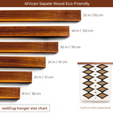 Set of six African Sapele Wood Wall Hanging Rug Hangers in assorted lengths, shown with a wall art rug for size reference—an eco-friendly choice for stylish wall decor.