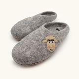 Love Ewe Hand-Felted Organic Wool Slippers for Women (Blush-DG) feature a cute sheep face design, hand-sewn suede soles for extra comfort, and are crafted from soft, organic wool.