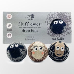 A box of Fluff Ewes 100% Premium Wool Dryer Balls for Darks, eco-friendly and handmade fabric softener, 3-pack, with three character balls shown in front.