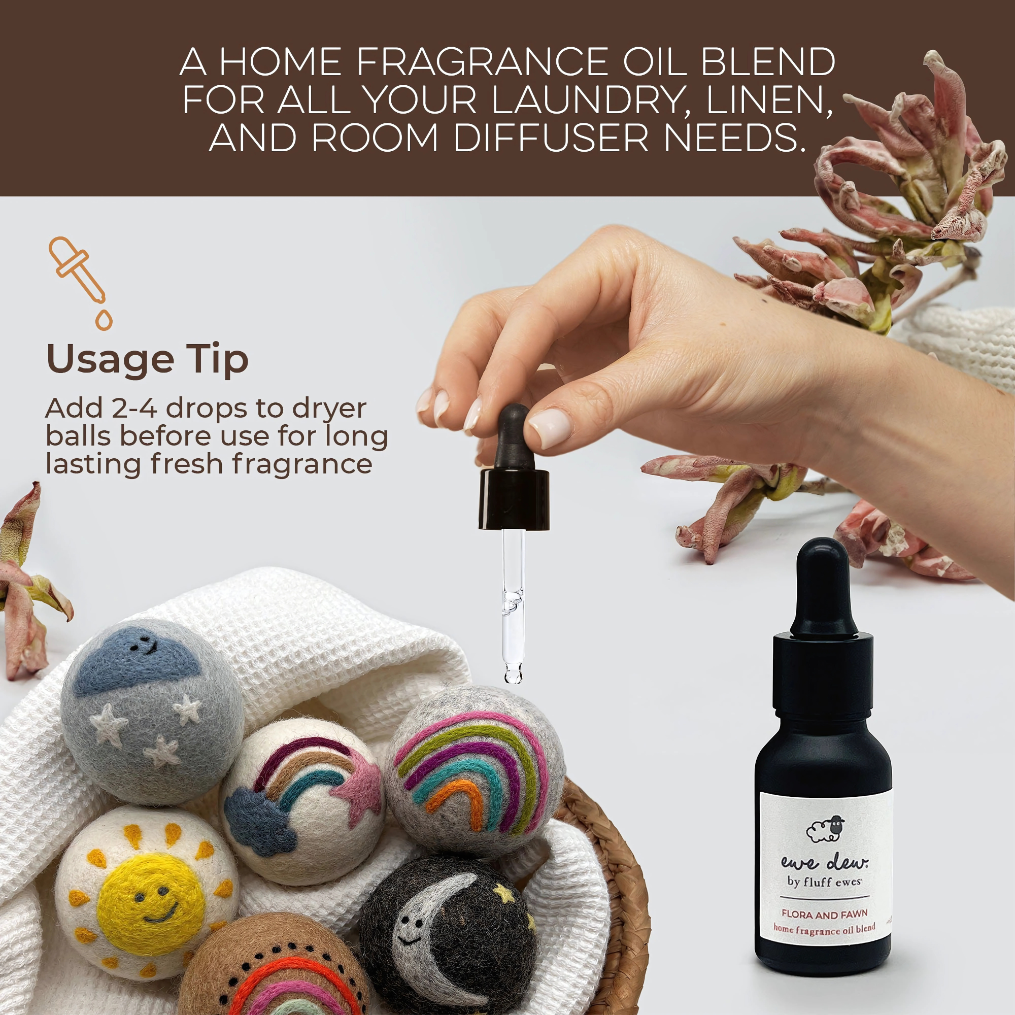 A hand adds Ewe Dew by Fluff Ewes Meadow Mist Laundry, Home Fragrance + Aromatherapy Essential Oil Blend to colorful wool dryer balls, with the fragrance oil bottle and laundry scent booster tip also visible.