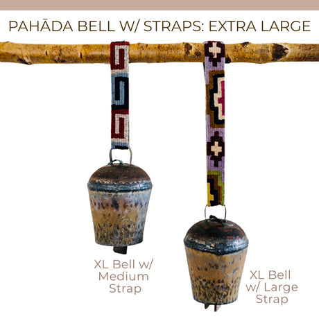 Two vintage handmade Pahāḍa yak, goat & sheep bells from the Himalayas of Nepal and Tibet hang by colorful straps. These 9" Christmas ornaments support fair trade artisans and are perfect for wreath decor or sound baths.