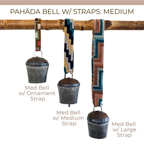 Three vintage handmade Pahāḍa yak, goat & sheep’s bells from the Himalayas of Nepal and Tibet hang on a wooden rod, each with unique straps. These 5" fair trade ornaments add authentic charm to wreaths or sound baths.