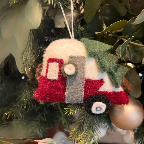 Decorate your tree with this charming Pair of Camper Christmas Tree Ornaments—handmade felt ornaments that add festive flair and holiday cheer to your décor.