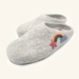 Love Ewe Hand-Felted Organic Wool Slippers for Women (Rainbow-Light) have hand-sewn soles and feature a rainbow, blue cloud, and pink star embroidered on the gray felt top.