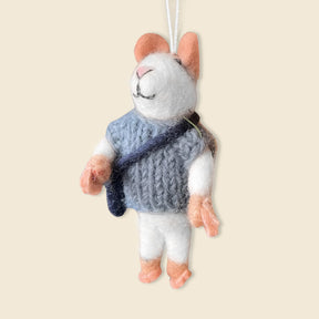 The School Boy Mouse is a handmade felt wool ornament wearing a blue sweater and small bag, hanging by a white string. Crafted in fair trade Nepal, it's a charming addition to your Christmas decor.