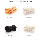 Four bundles of yarn in apricot, stone, onyx, and fawn—each labeled with its name and number—perfect for crafting the Chysto (Pure) Wool Statement Bed Blanket inspired by Ukrainian star symbols.
