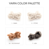 Four yarn color samples—Fawn, Stone, Buckwheat, and Ash—of all-natural undyed yarn are shown on white, ideal for crafting the Myr (Peace) Wool Statement Bed Blanket or highlighting a rhombus-dot design.