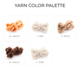 Five yarn bundles in Apricot, Fawn, Biscuit, Walnut, and Stone—arranged in a gradient—offer perfect hues for crafting the Tkach (Weaver) Wool Statement Bed Blanket, whether as a cozy layer or a bold focal point.