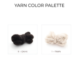 Two yarn samples from the Blysk (Shine) Wool Framed Wall Art—black ("Onyx") and light beige ("Fawn")—are shown on a white background, ideal for minimalist wall art or eco-friendly textured decor.