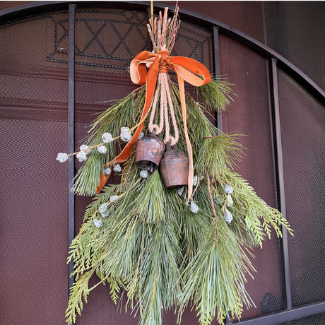 A Vintage Ornament Handmade Pahāḍa Goat & Sheep's Bell from the Himalayan Mountains of Nepal and Tibet makes charming wreath decor or wind chimes for a festive, handcrafted touch.