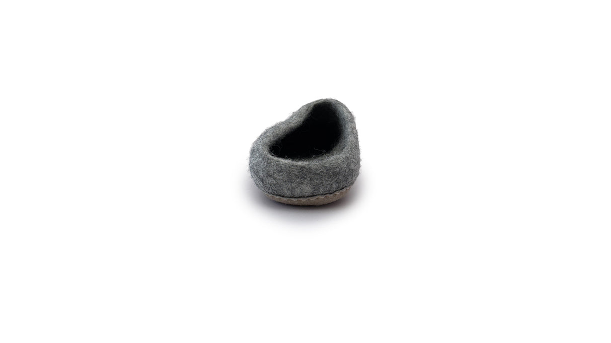 A single gray Love Ewe Hand-Felted Organic Wool Slipper for Men (Beau-G) with a rounded opening, shown on a white background. Experience the comfort of handmade Nepali craftsmanship.