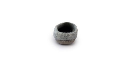 A back view of the Love Ewe Hand-Felted Organic Wool Slippers for Women (Peace-LG) in gray with a brown sole, made from organic New Zealand wool, shown on a white background.