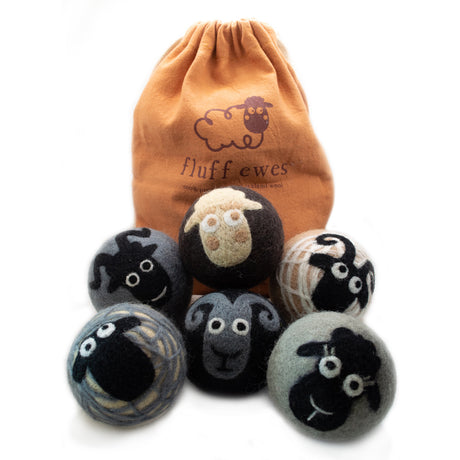 Get a Gift Bundle: Buy 3 Sets of Fluff Ewes Natural Dryer Balls, Get 1 Set Free—adorable organic wool dryer balls with sheep faces in an orange "Fluff Ewes" bag for a cute, eco-friendly laundry upgrade.